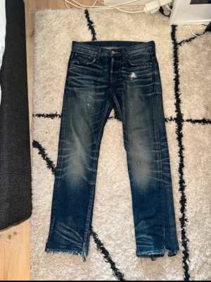 custom made jeans  - Selling these crazy jeans with an amazing homemade wash and distressed look. Good condition except heel drag. Measurements are Width: 44,5cm Length: 103cm Leg opening: 20cm