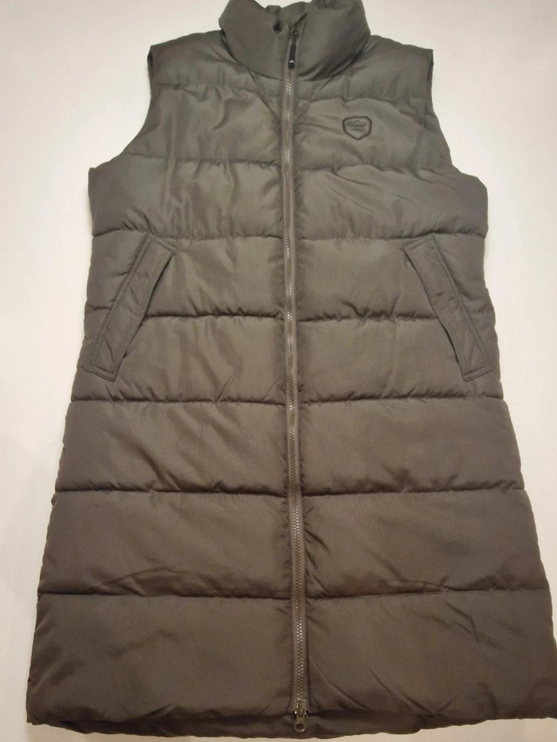 Lång väst i olivgrönt