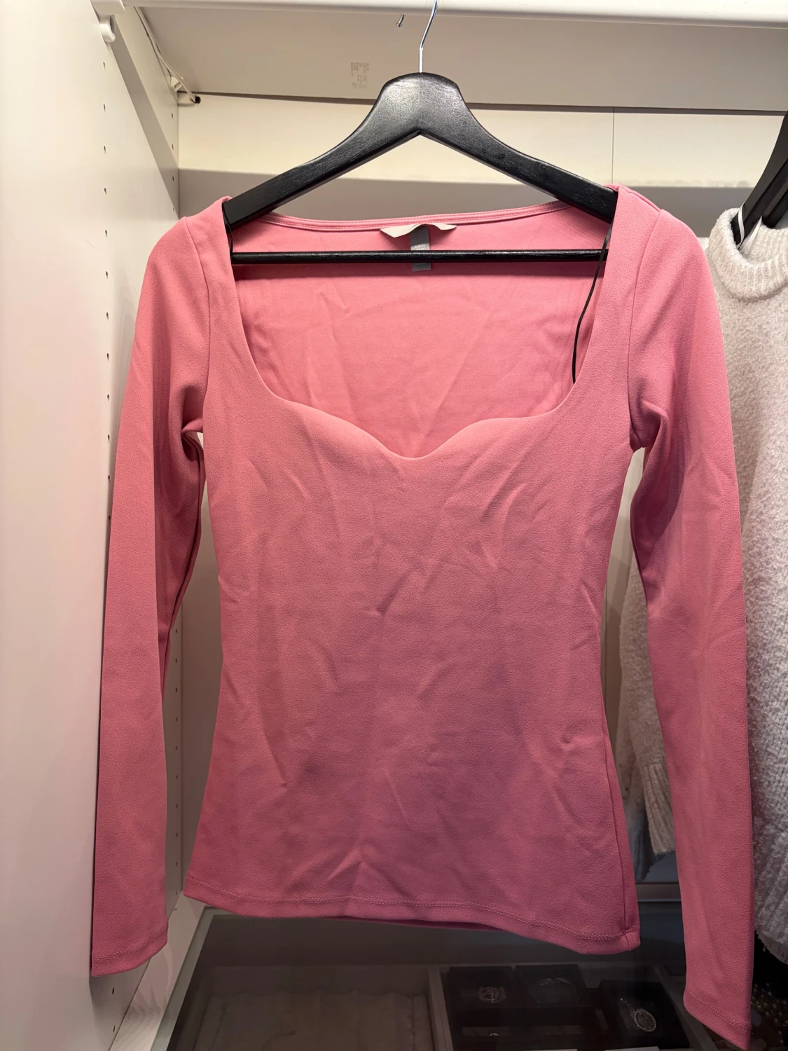 Rosa långärmad topp med urringning