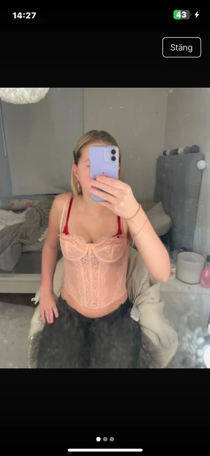  Rosa korsett topp -  Använd en gång som ny jättefin sitter som en korsett topp kan användas till jättefina träffar eller fester 