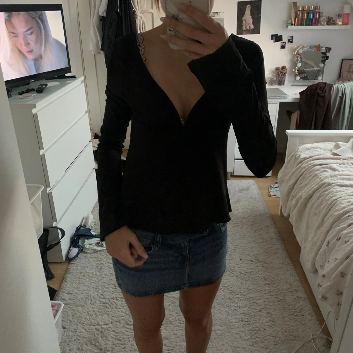 Svart långärmad omlottopp med öppen rygg