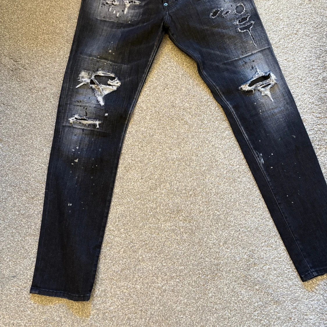Svarta Dsquared2 jeans med slitningar