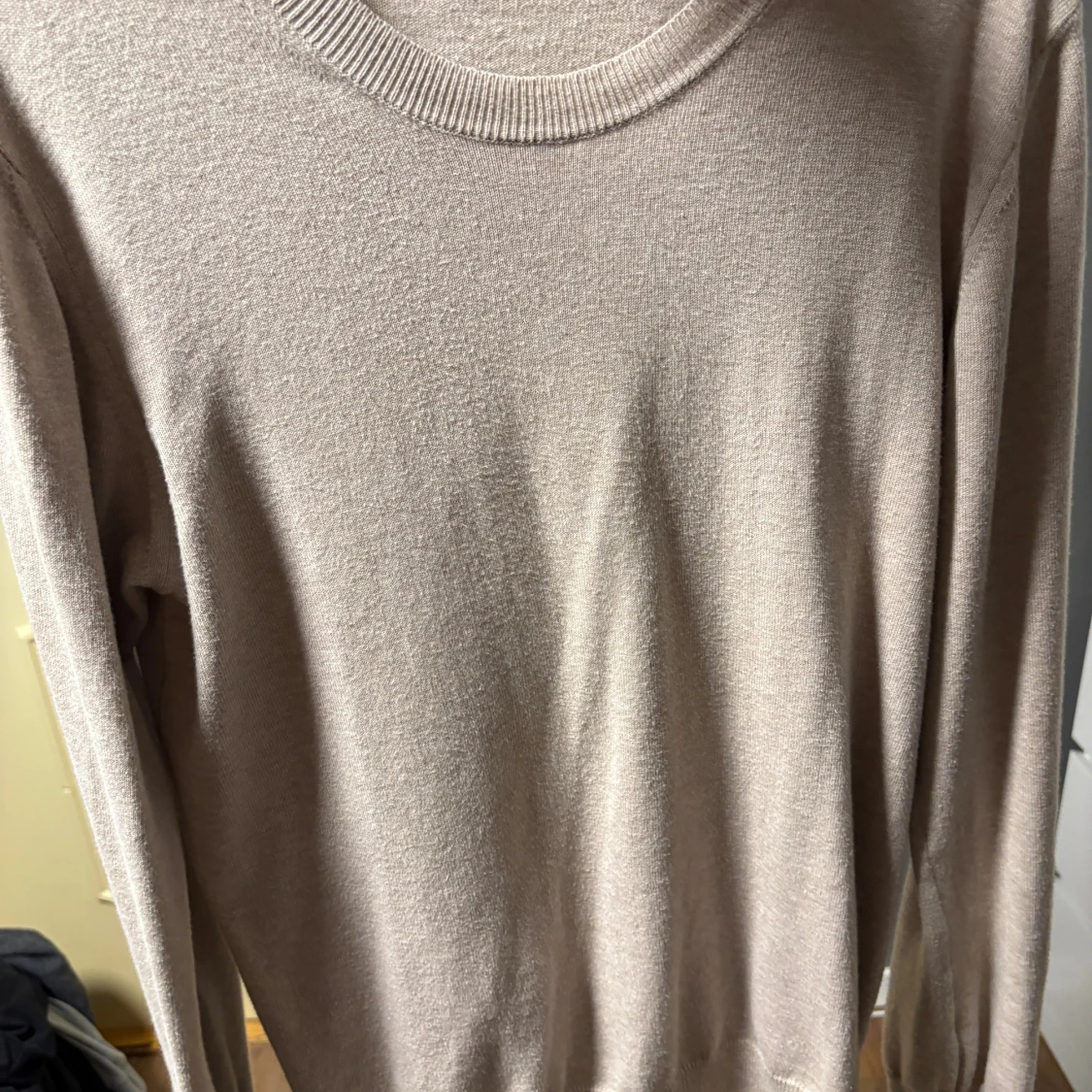 Beige kofta från Oscar Jacobson