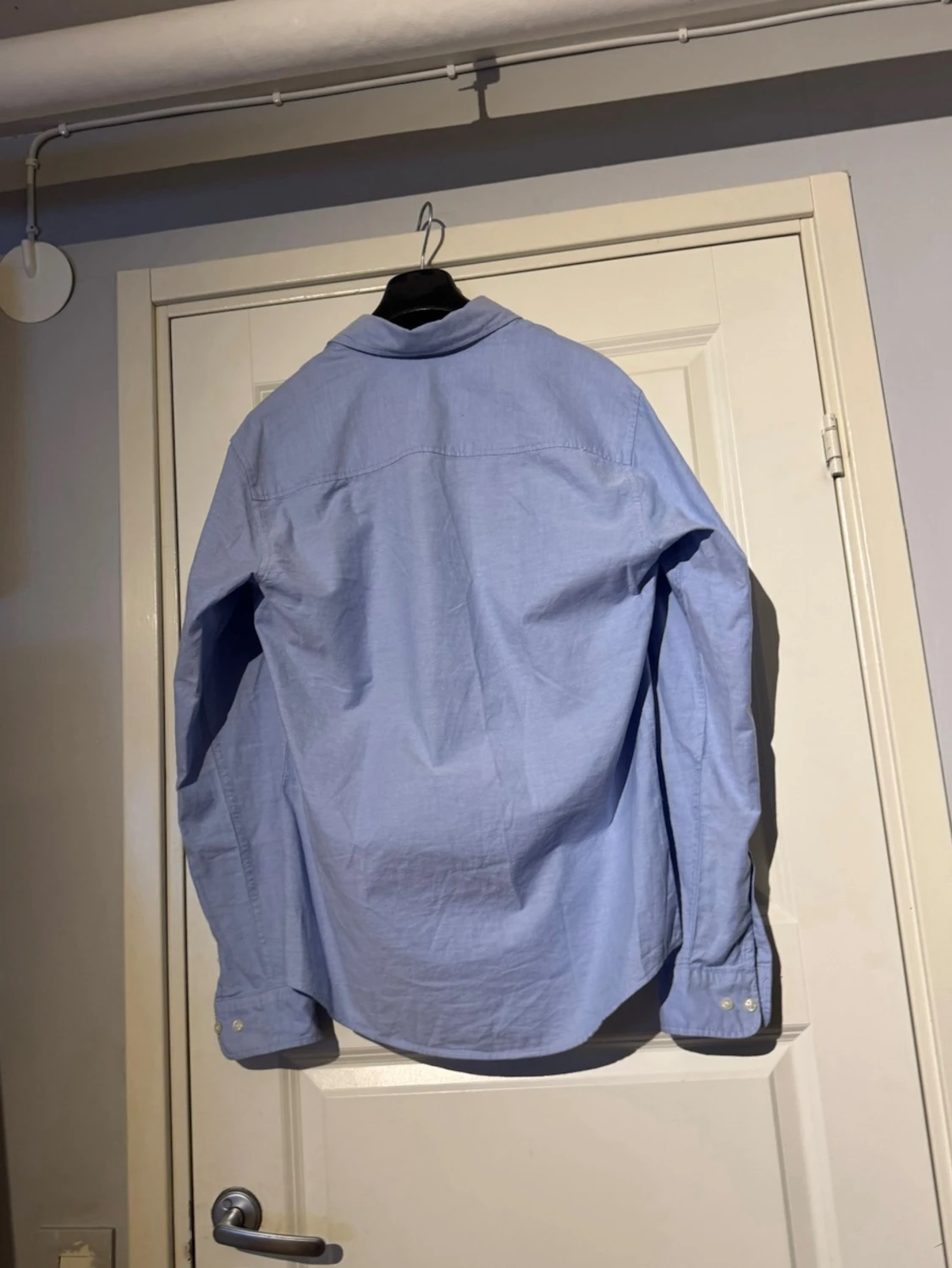 Ljusblå skjorta  - 1