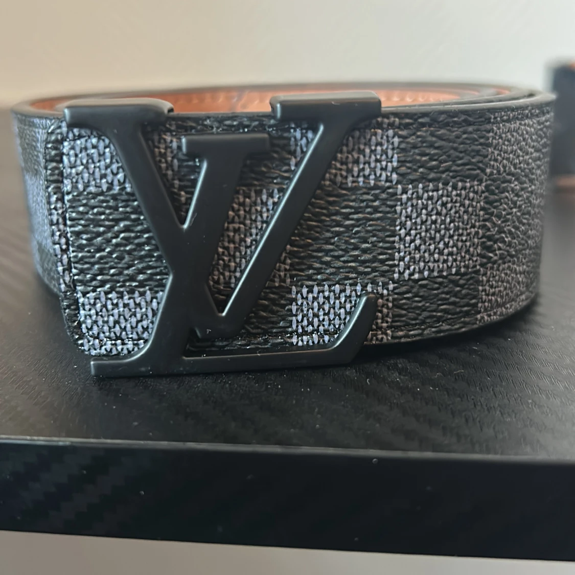 V-L (baklänges) bälte