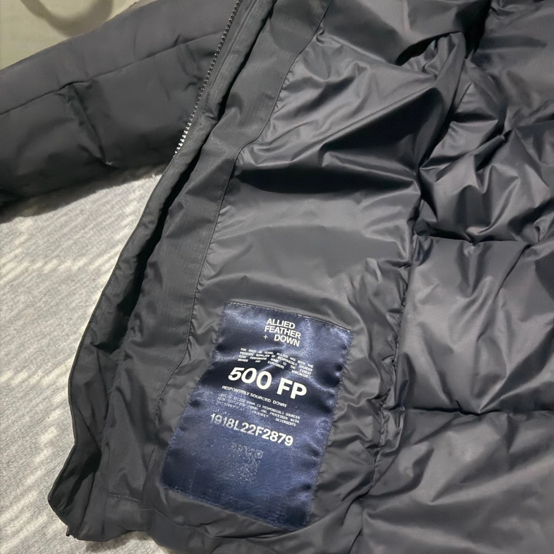 Svart dunjacka från Sail Racing - 2