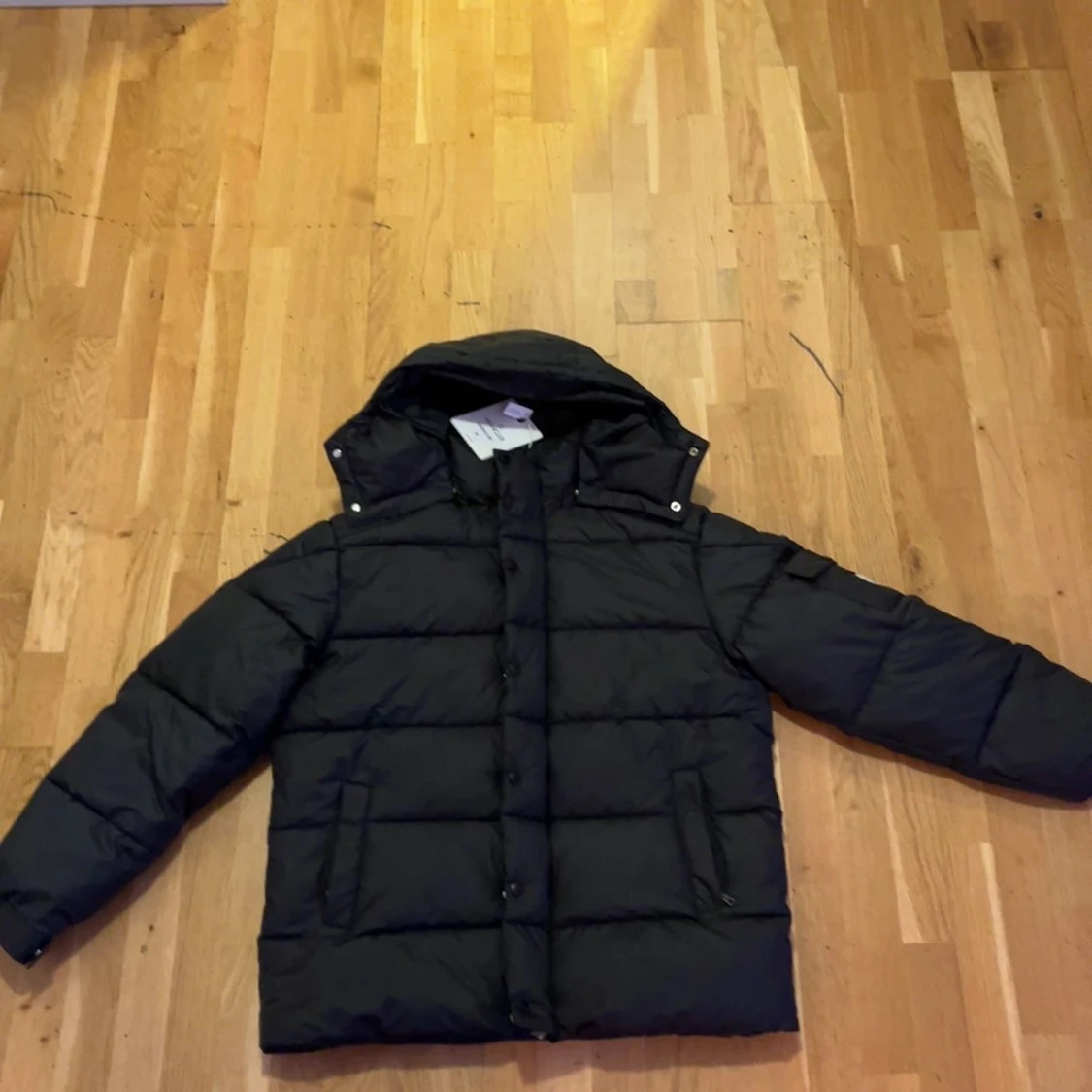 Svart pufferjacka från Moncler verzere