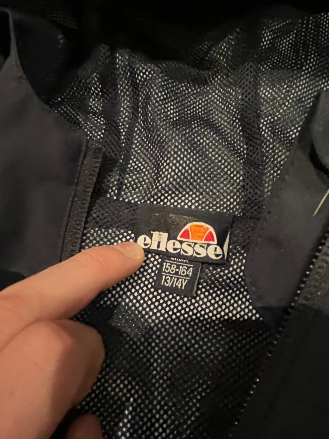 Mörkblå vindjacka från Ellesse med huva - 1