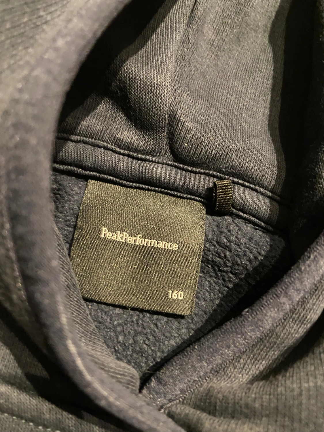 Mörkblå hoodie Peak Performance - 1