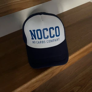 Navyvit NOCCO  - Snygg NOCCO Keps jätte bra skick använd få gånger! Äkta! Skicka gärna prisförslag 