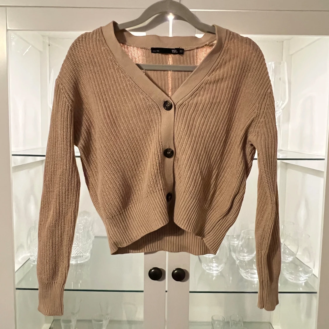 Beige stickad kofta från 157 XS