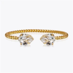 Caroline Svedbom armband - Guld armband med silver sten från Caroline Svedbom, tappat lite färg men är fortfarande i bra skick💞💞säljer då jag redan har en annan. Lådan medföljer!