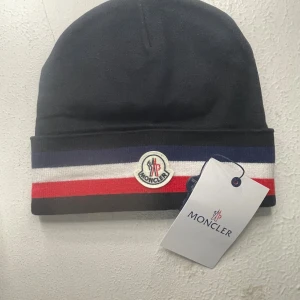 Mössa  - Sprillans ny mössa no size dm vid intresse 