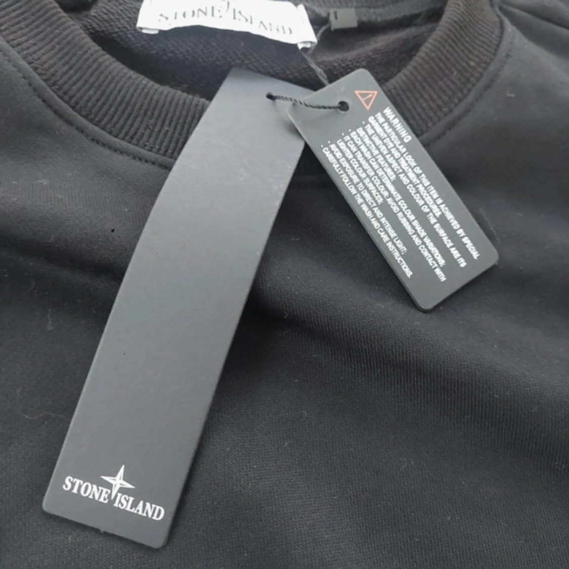 Svart sweatshirt från Stone Island - 1