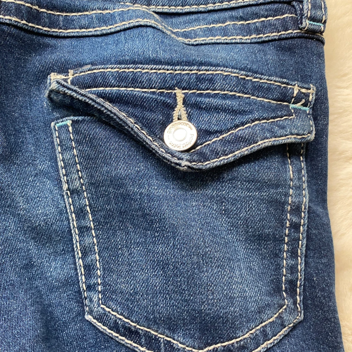 Blå bootcut jeans från Gina Tricot - 1