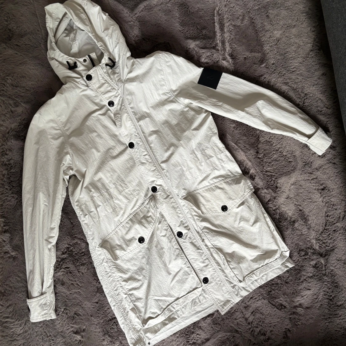 Vit parkajacka från Peak Performance