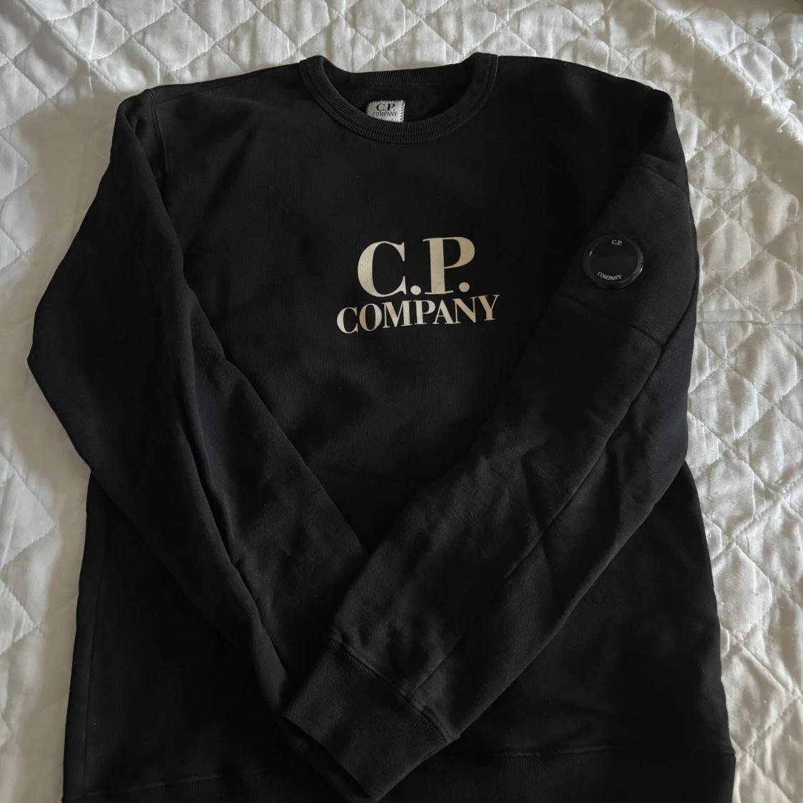 Svart sweatshirt från C.P. Company