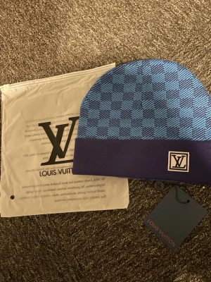 Lvmössa - Blå mössa.