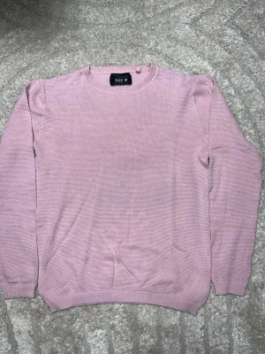 Ljusrosa stickad tröja Jean Pascale - Storlek M men är mindre i storlek som small S