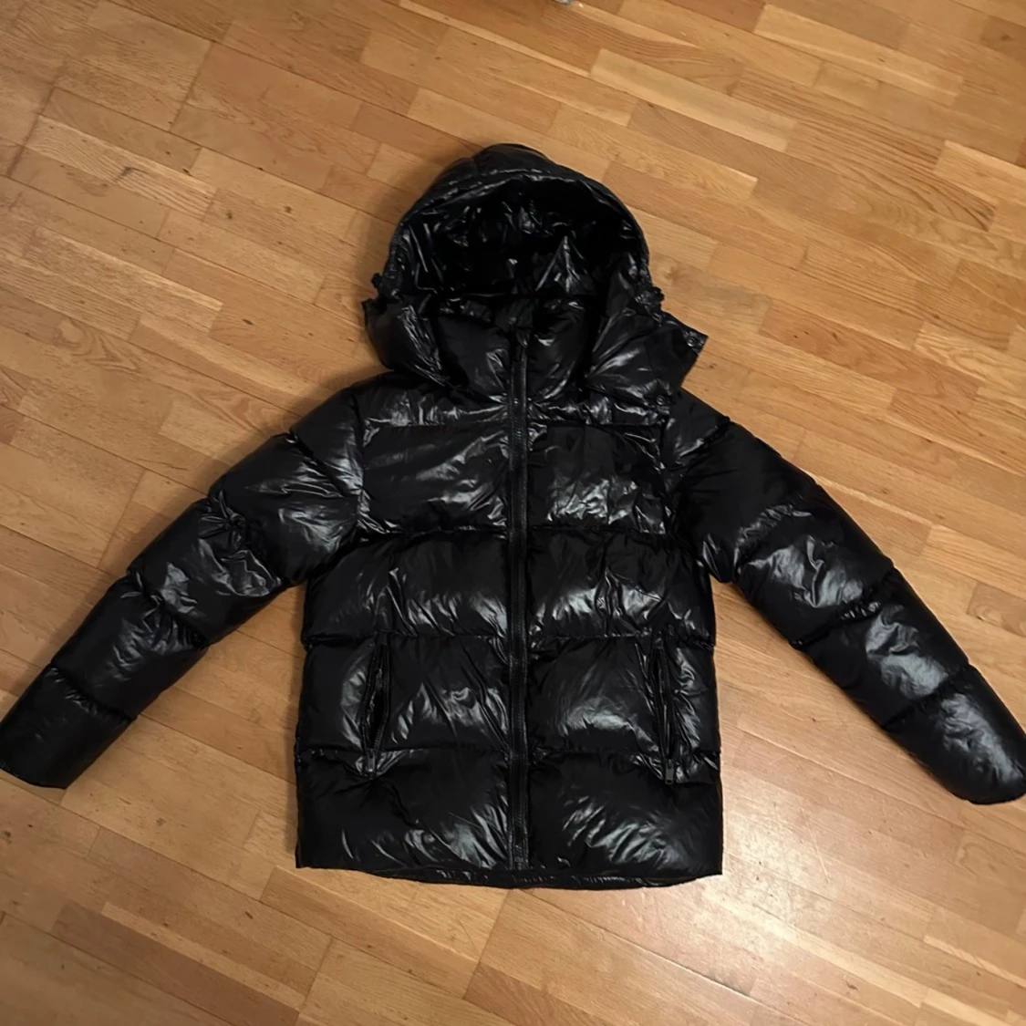 Svart pufferjacka