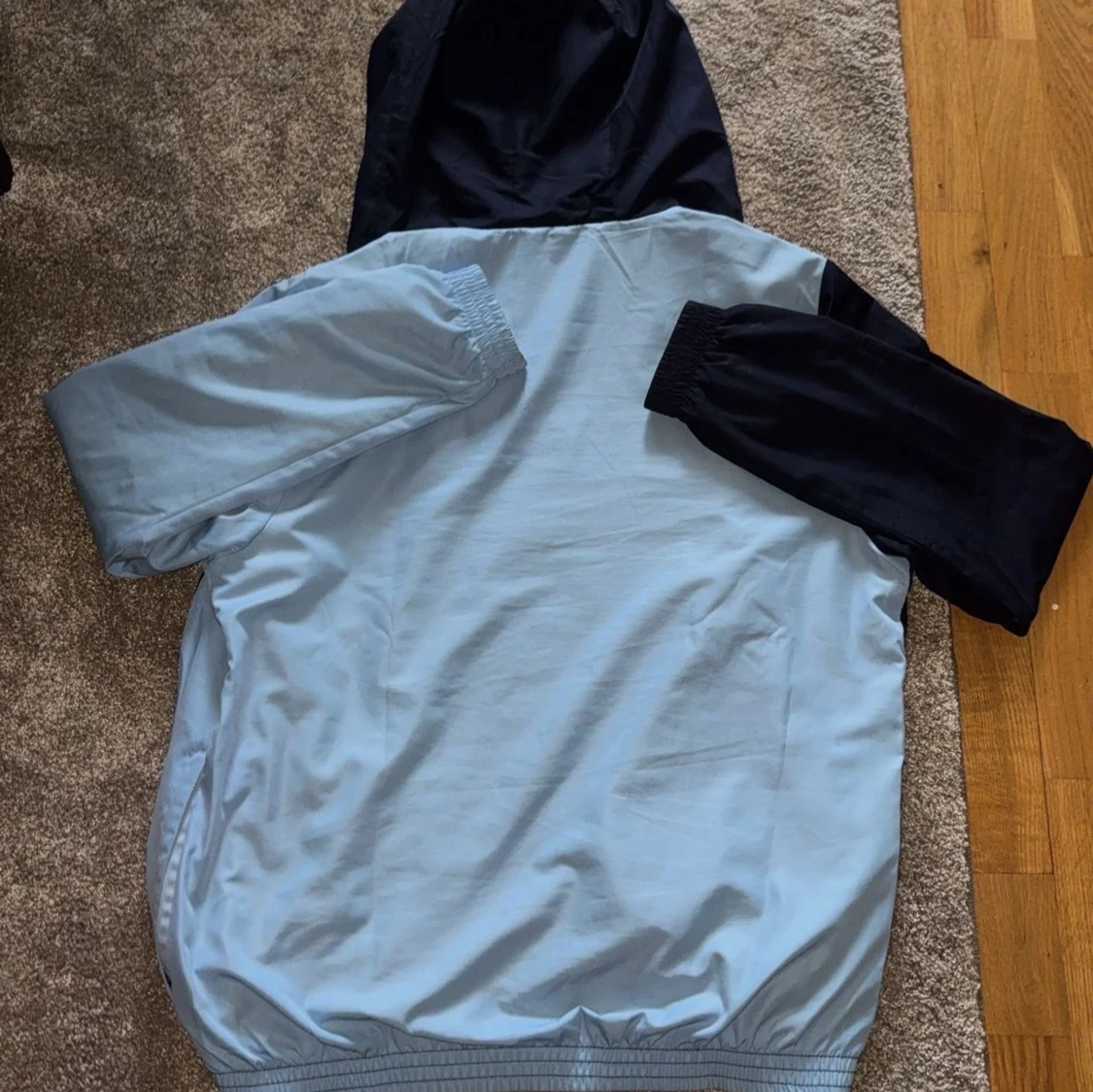 Lacoste blå vindjacka med huva - 1