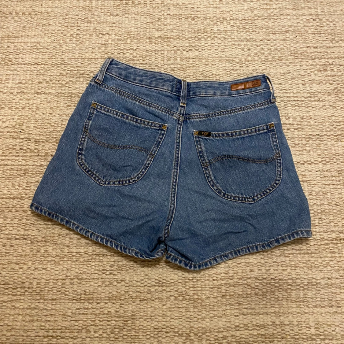 Blå denimshorts från Lee W27 - 1