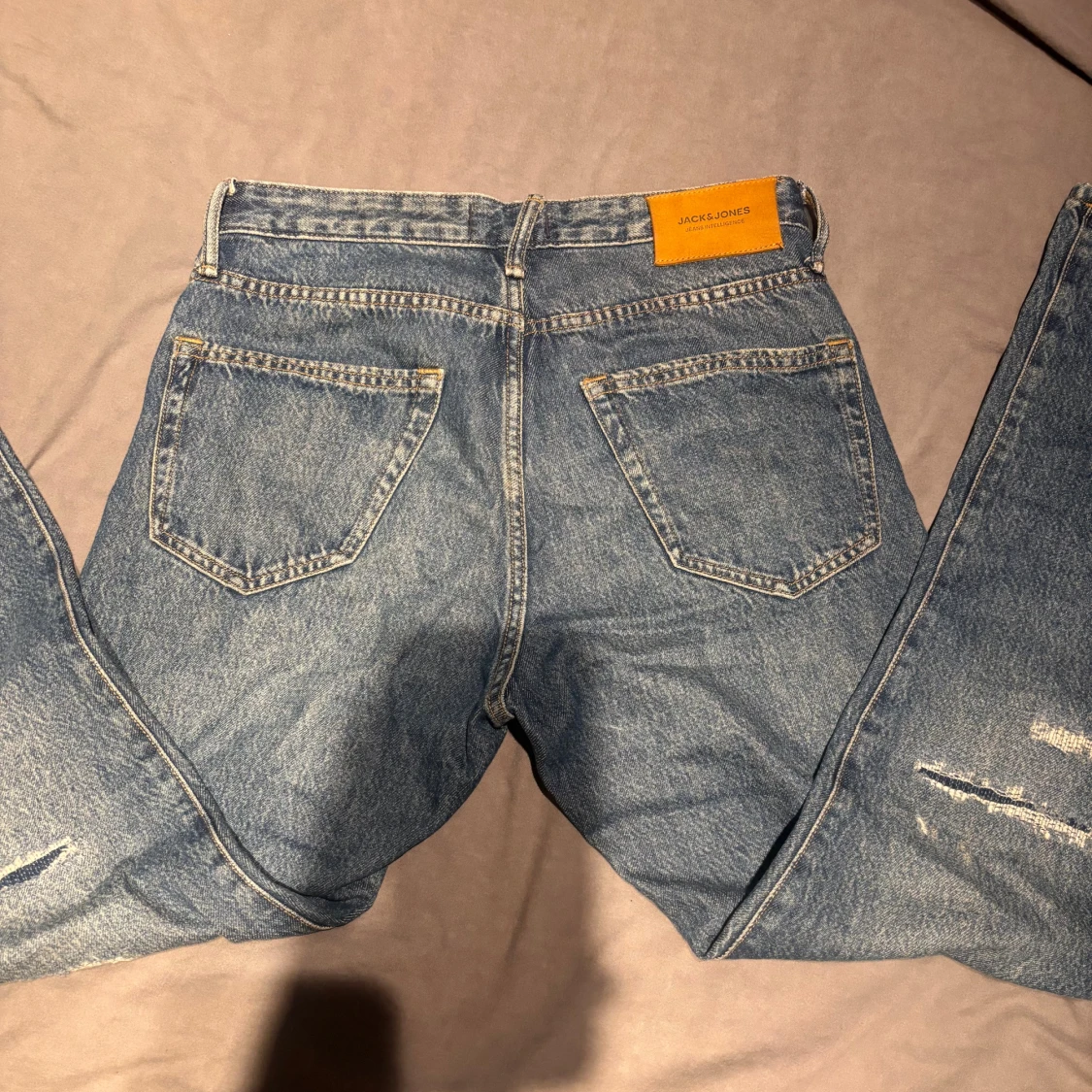 NYA 40% rea  Jack & Jones Blå jeans med slitningar 