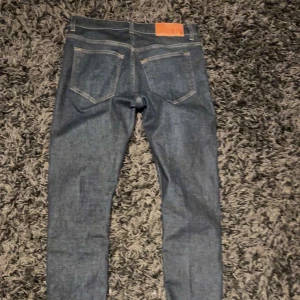 Tiger Of Sweden Jeans  - Ett par mörkblåa Tiger of Sweden jeans. Storlek W29 L32. Knappt använda och inga defekter.