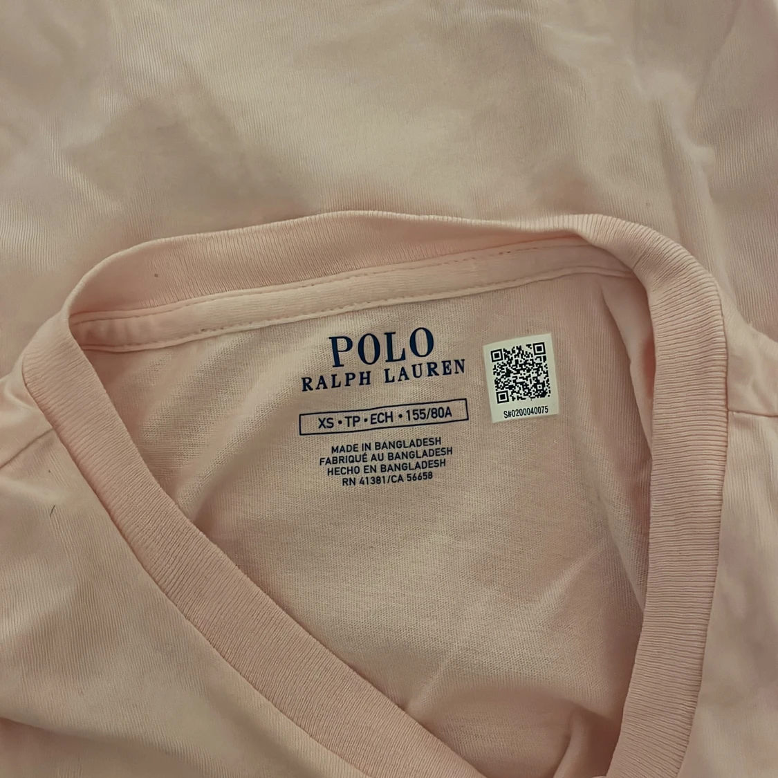 Ljusrosa polo t-shirt - 1