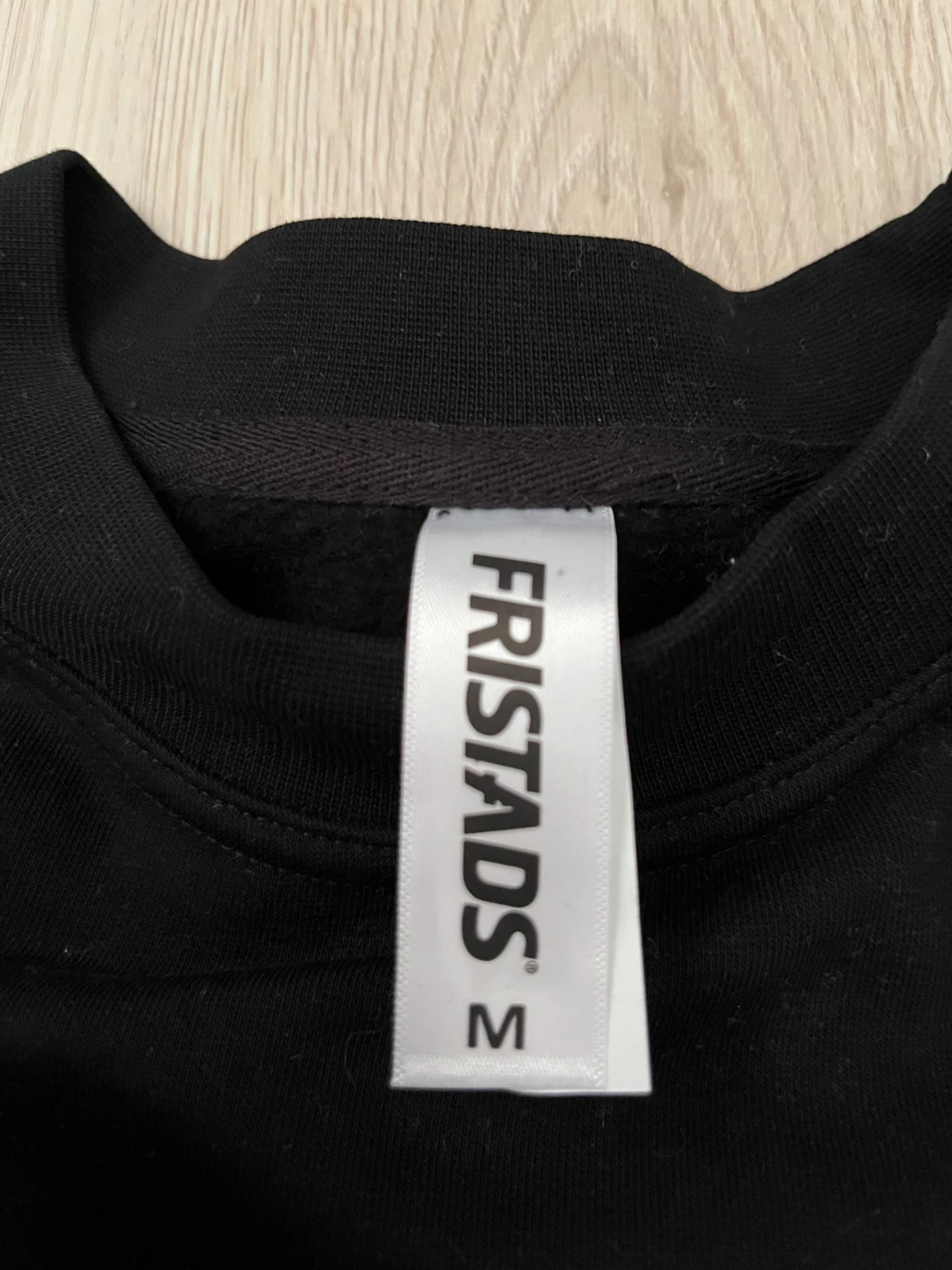 Svart sweatshirt från Fristads M - 1