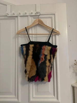 vintage pälstopp  - köpt i tokyo i en vintagebutik, äkta päls, oanvänd av mig 