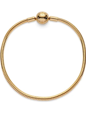 Pandora guld armband  - Elegant och tidlöst Pandora-armband i guld, den hårda modellen (bangle). Armbandet har en stilren och minimalistisk design som passar både till vardag och fest. Perfekt som det är eller att kombinera med Pandora-berlocker för en personlig touch.Pris diskuteras vid snabb affär. 