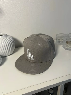 Grå la keps 55 - La keps