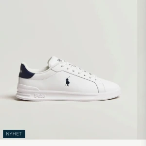 Vita sneakers från Polo Ralph Lauren - Storlek 38 men ganska små i storleken 