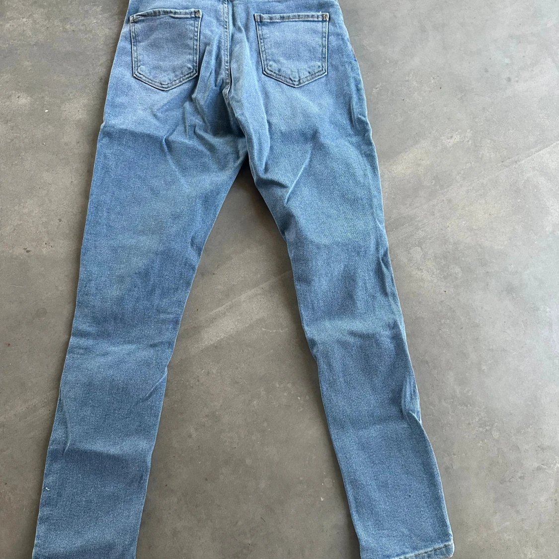 Ljusblå ripped skinny jeans XS - 1