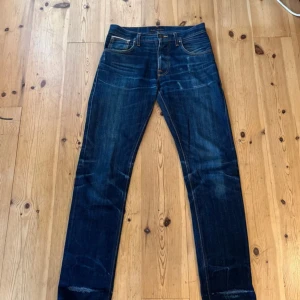 Selvedge Nudie jeans - Riktigt snygga Nudie selvedge i modellen steady Eddie. Jeansen har sjuka Fades och är i storlek 30/34. Om du har någon fundering så är det bara att fråga! 