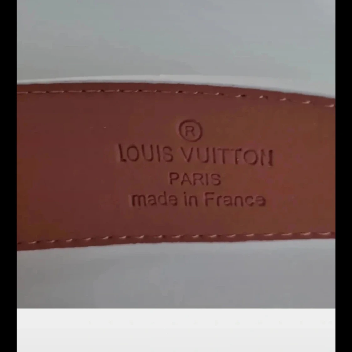 Rutig L&V bälte i skinn - 1