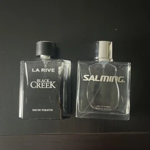 Salming Eau de Toilette 100ml och La rive black creek  - Fräsch och stilren eau de toilette från Salming. Flaskan rymmer 100 ml och passar dig som gillar sportiga och moderna dofter. Perfekt för dig som vill sticka ut med en unik touch.