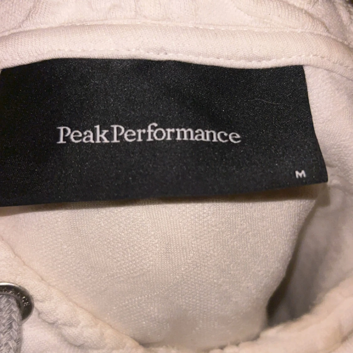 Vit hoodie från Peak Performance M - 1