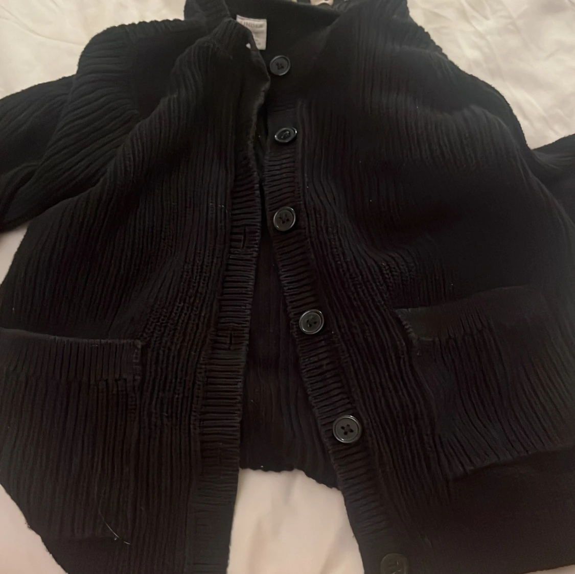 Svart kofta från Lindex med knappar