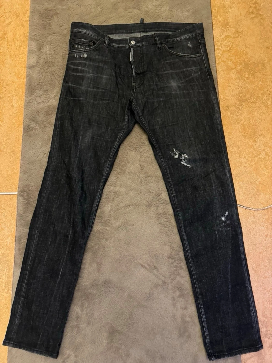 Svarta DSQ2 jeans med slitningar