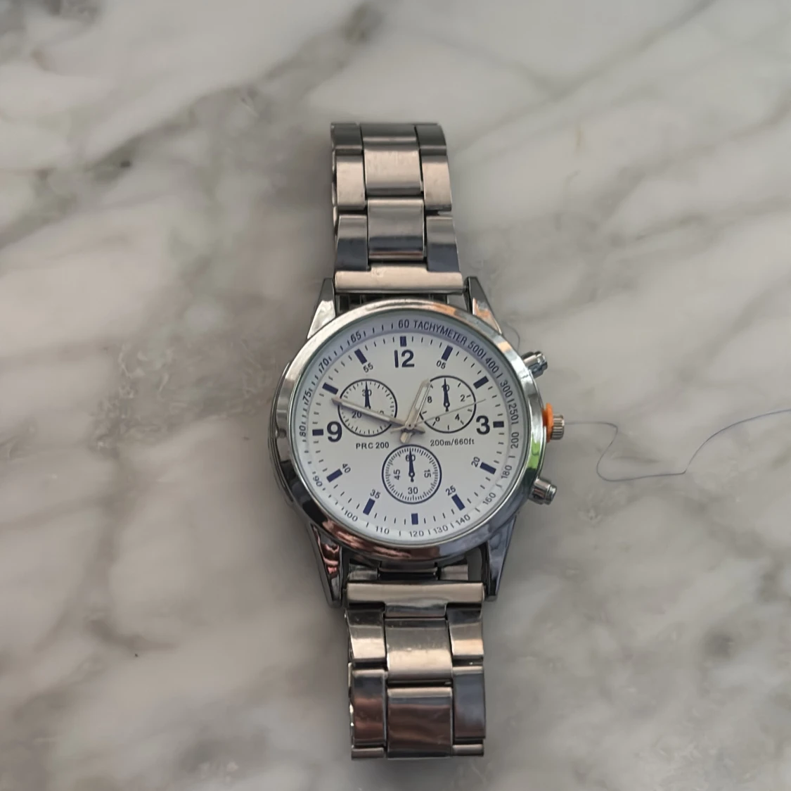 Silverfärgad kronografklocka PRC 200