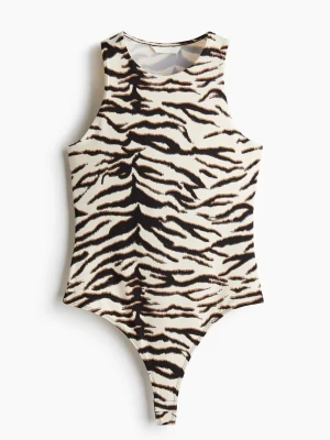Zebramönstrad bodysuit - Säljer denna supersnygg body som knappt är använd🦓🦓🦓