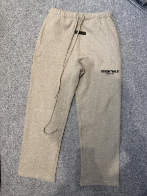 Essentials dark oatmeal gray baggy sweatpants - Size M true to size