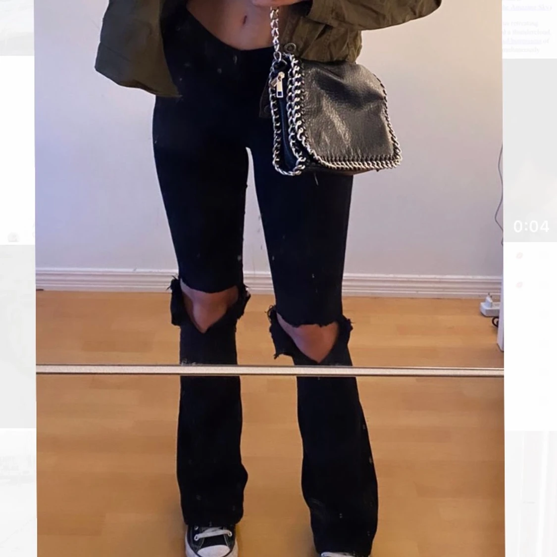 svarta lågmidjade jeans med hål 