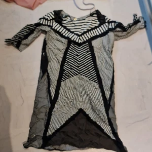 Klänning  - I fint använt skick. 