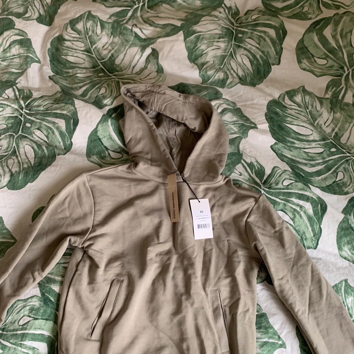 Grågrön hoodie i storlek XS