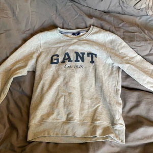 GANT - Ljusgrå gant 