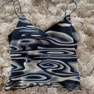 Topp  - Fin topp med härligt mönster! 