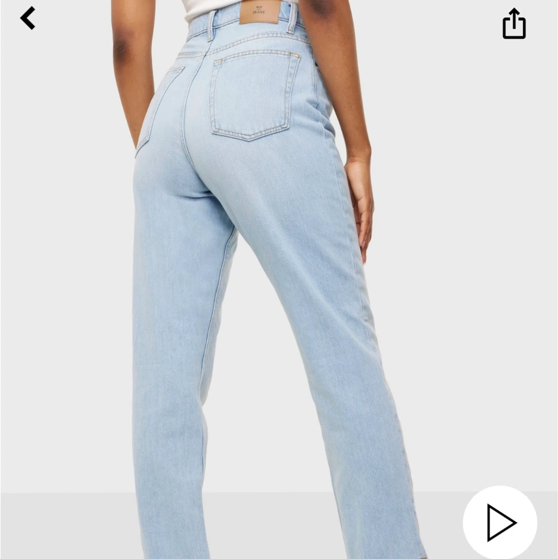 Högmidjade jeans med slits